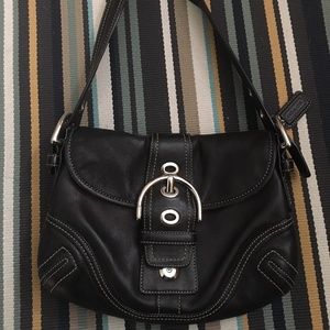 Coach black leather handbag with silver buckle